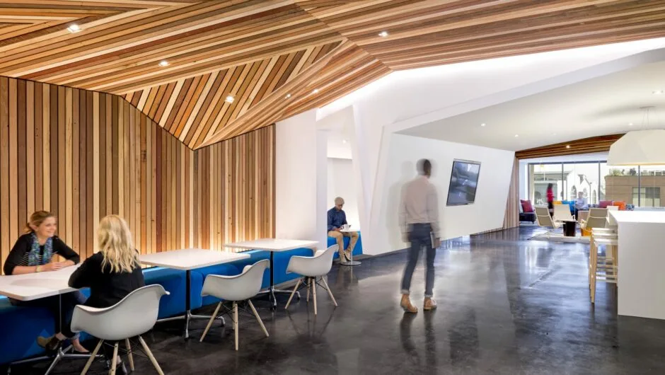 People exploring their space utilizing space management software for wayfinding and reserving space.