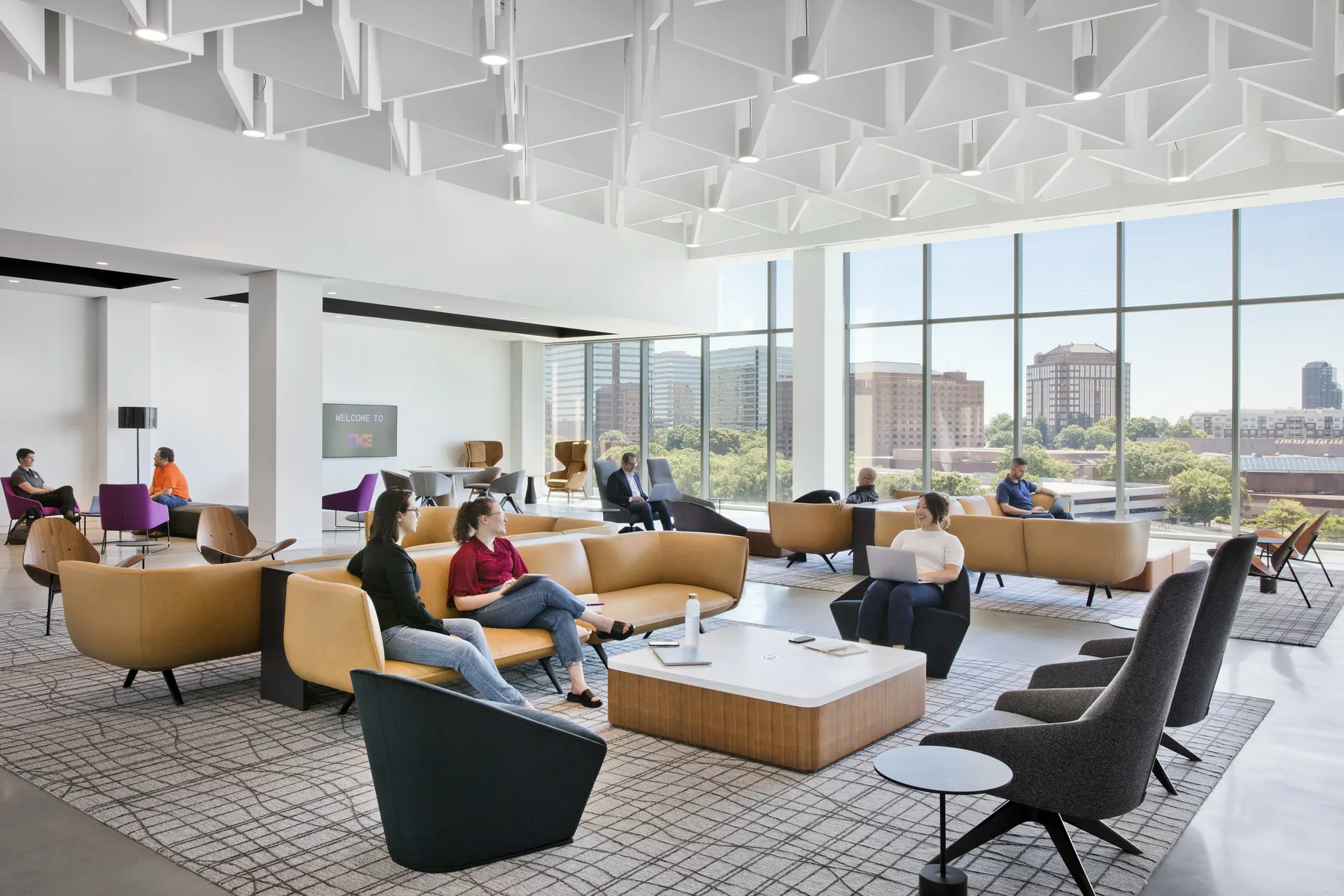 Free address hybrid workplace with employees utilizing wayfinding and space management technology to navigate the space.