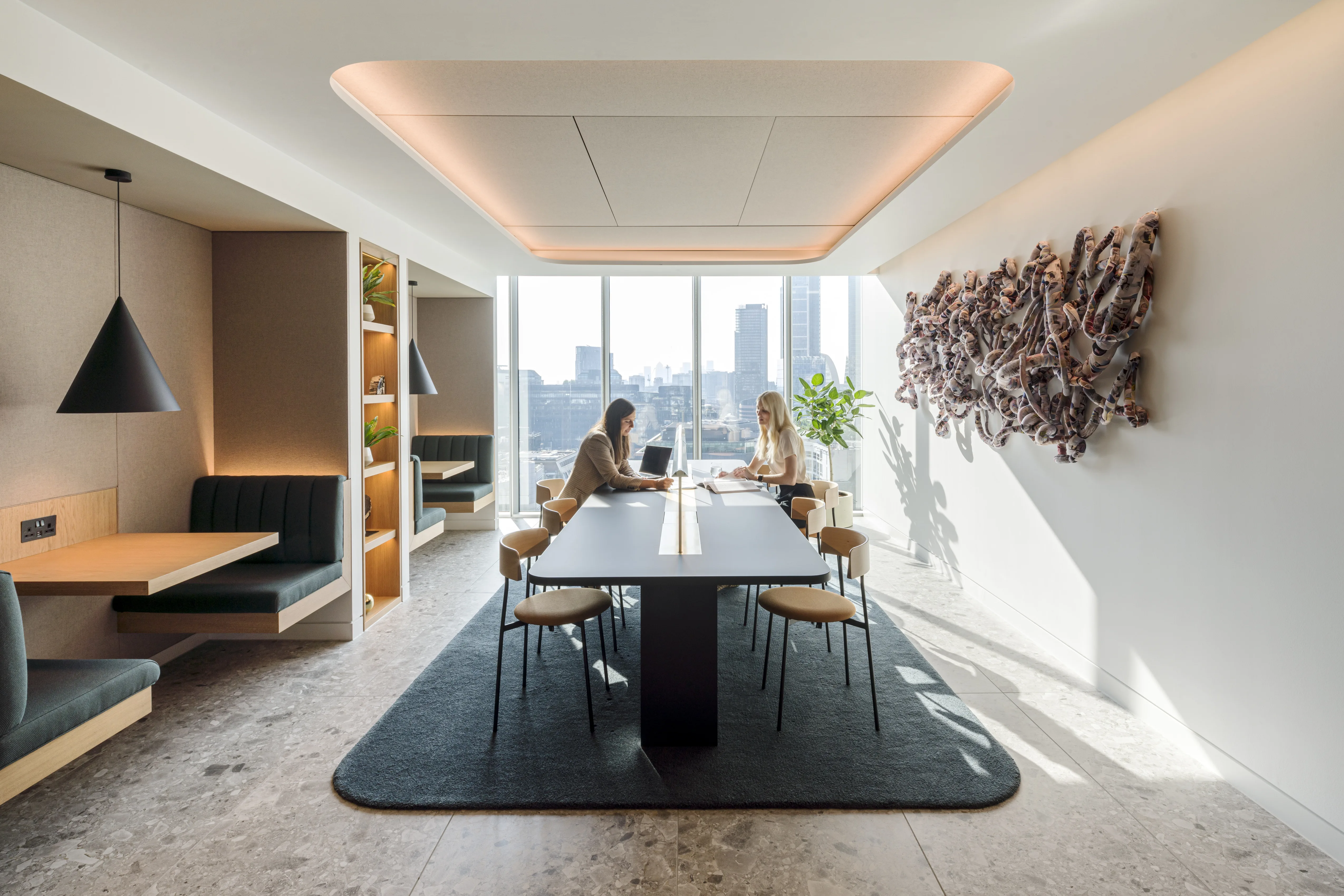 Law firm leaders discussing their space management technology, their free address workplace, and the use of wayfinding to navigate the hybrid world.
