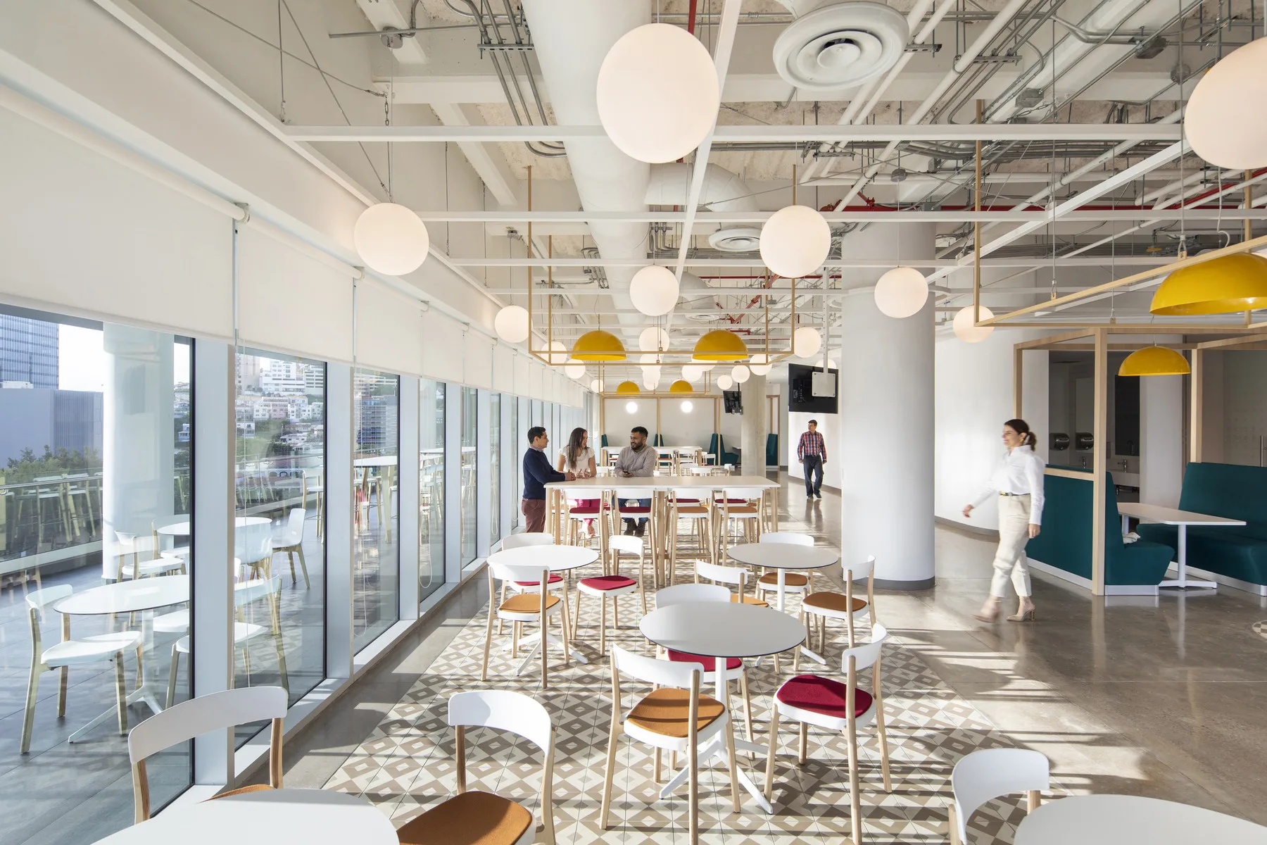 Free address office space supported by desk reservations and space management software.